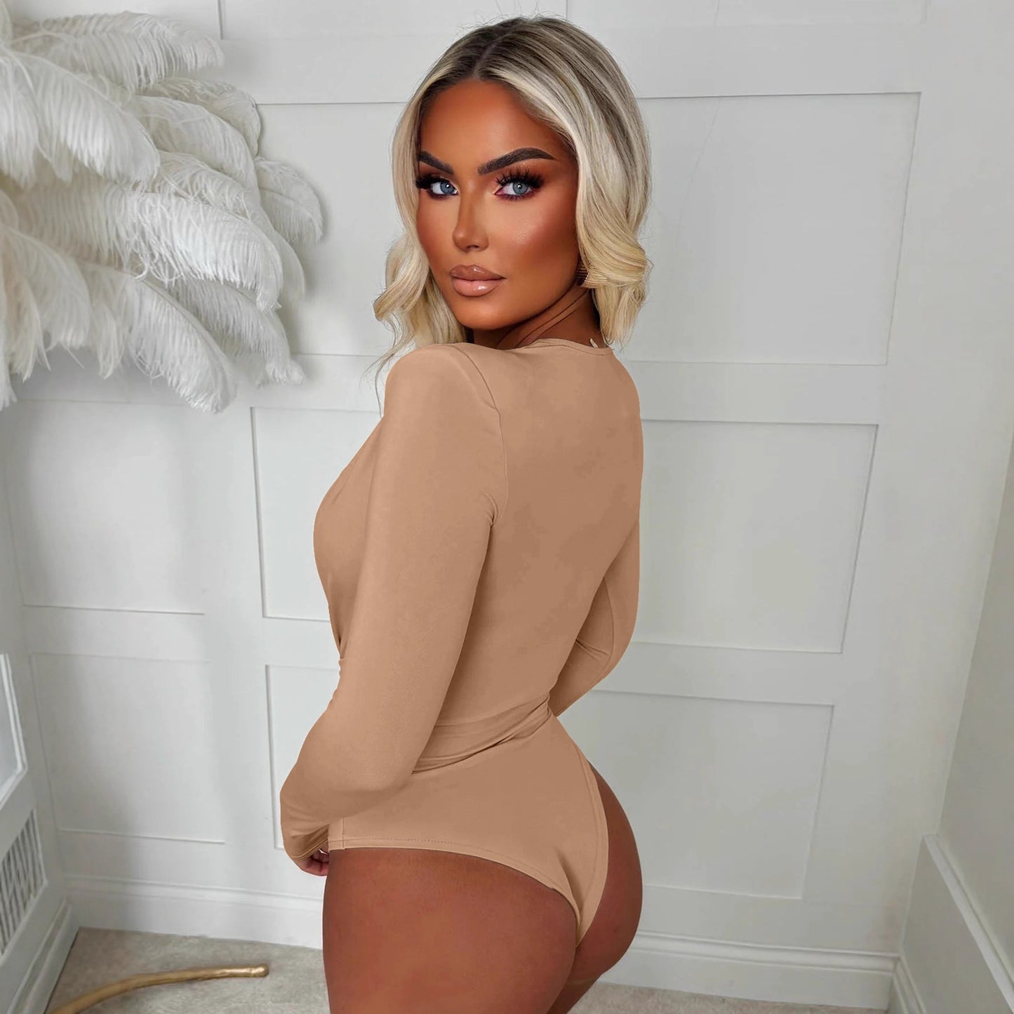 Fashionable V-neck tight fitting long sleeved jumpsuit