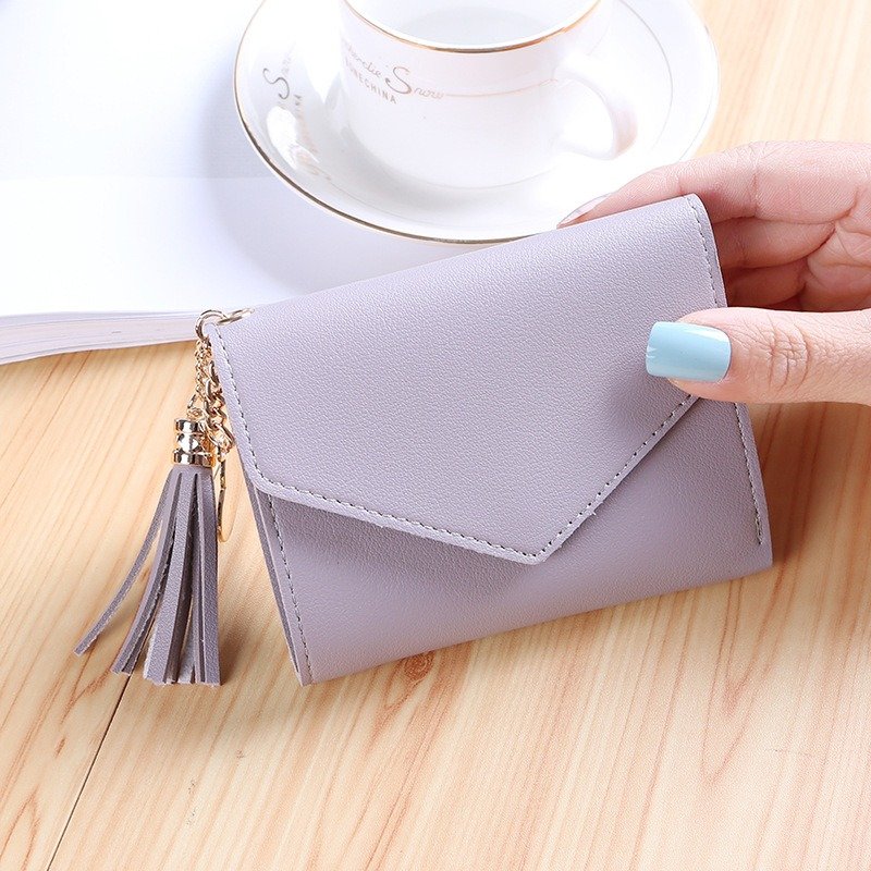 Small Fine Bag With Tassel Pendant