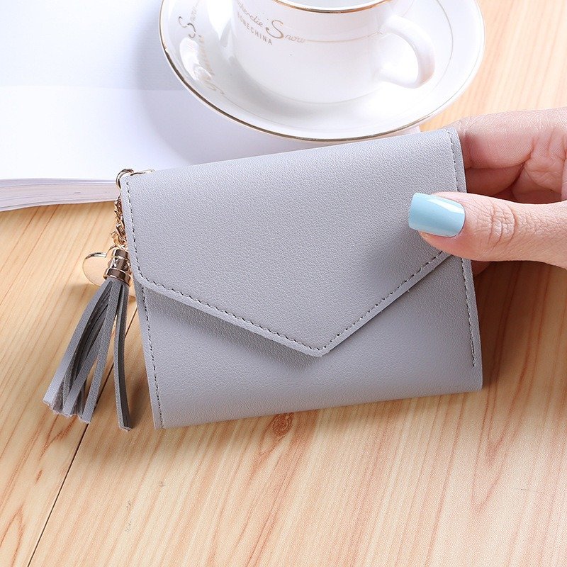 Small Fine Bag With Tassel Pendant