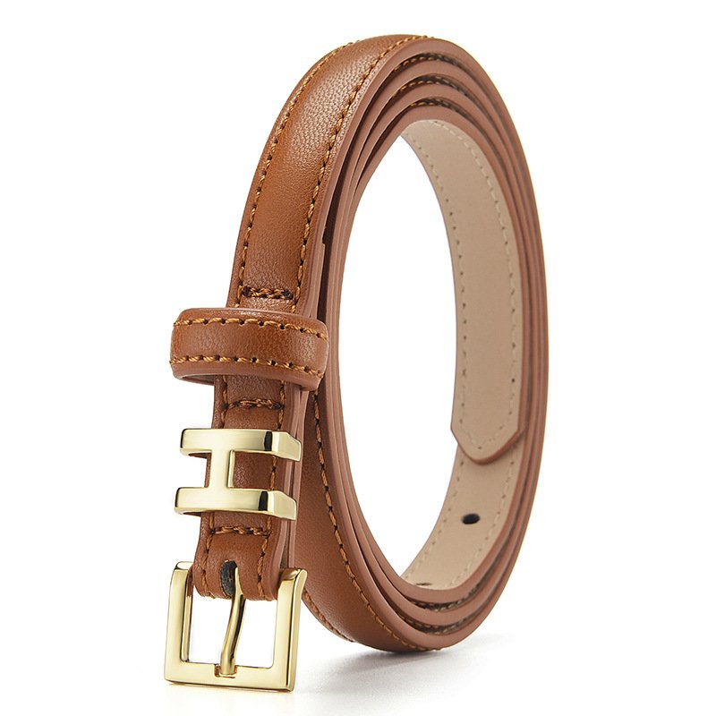 A sweet Lady's Slim Belt Adorns A Damp Trouser Belt