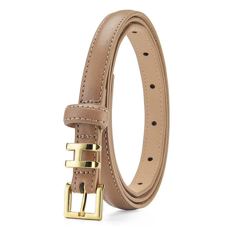 A sweet Lady's Slim Belt Adorns A Damp Trouser Belt